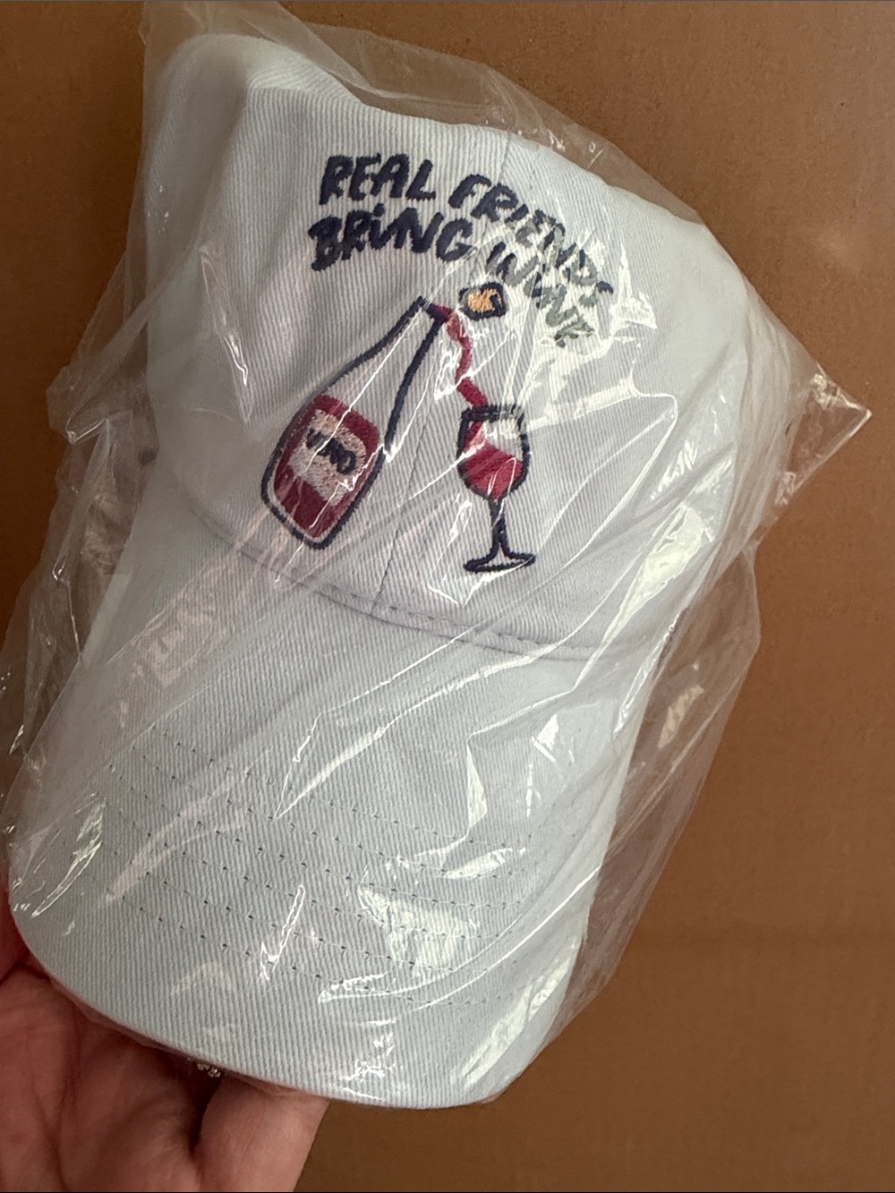 NWT Anthropologie White Embroidered 'Real Friends Bring Wine' Baseball Cap